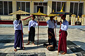 Ear piercing ceremony at Mahamuni Buddha Temple, Myanmar 